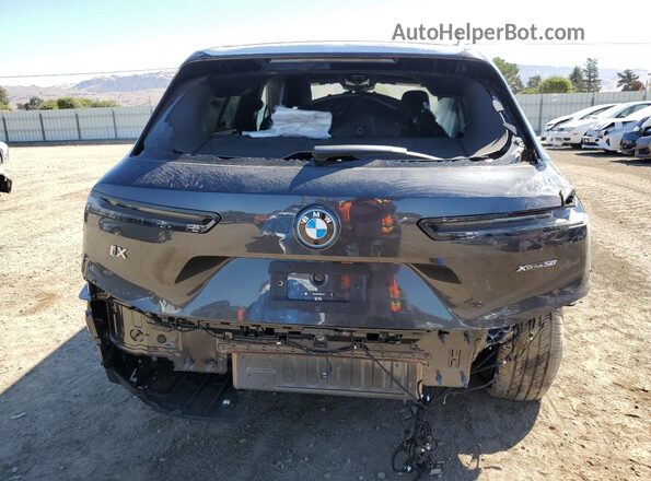 WB523CF00SCU13476 2025 BMW IX Black Vista trasera