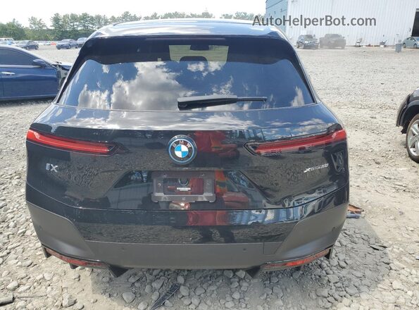 WB523CF02PCM78966 2023 BMW IX Black Вид ззаду