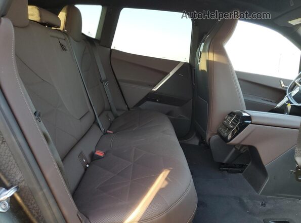 WB523CF04RCN52035 2024 BMW IX Black Սալոնի հետևի տեսք