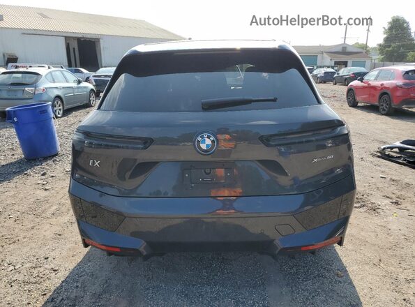 WB523CF04RCN74259 2024 BMW IX Gray Вид ззаду