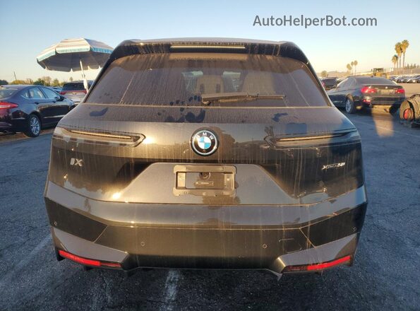 WB523CF06SCT06612 2025 BMW IX Black Հետևի տեսք