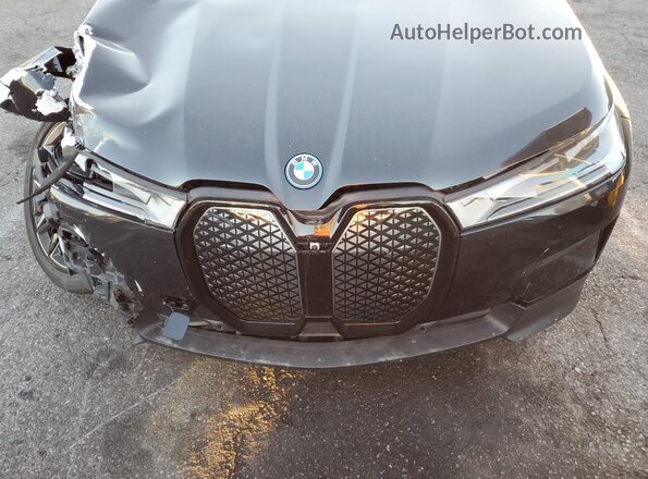 WB523CF06SCT06612 2025 BMW IX Black Շարժիչի բաժամունքի տեսք