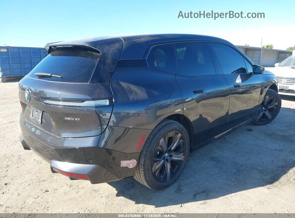 WB523CF08RCR62983 2024 BMW IX Gray Trasero derecho