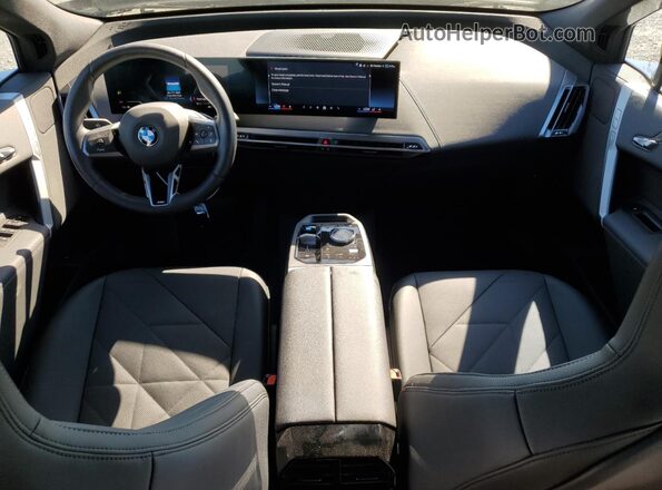 WB523CF09SCT24179 2025 BMW IX Black Dashboard view
