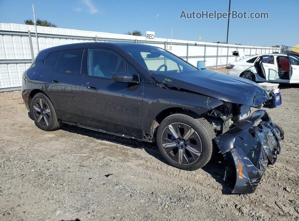 WB523CF09SCT24179 2025 BMW IX Black Front right