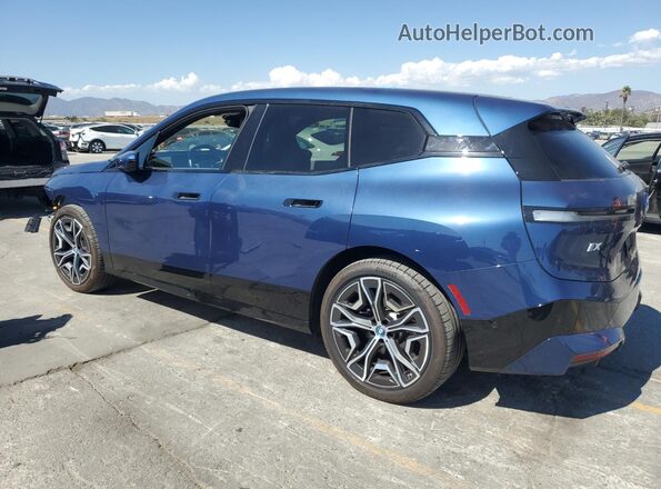 WB523CF0XSCS38055 2025 BMW IX Blue Հետևի ձախ