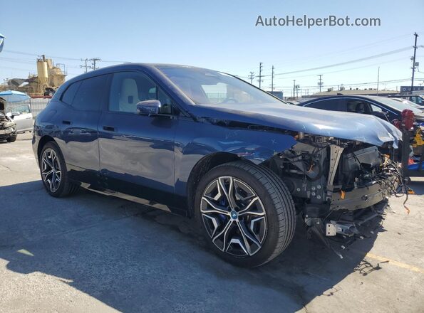 WB523CF0XSCS38055 2025 BMW IX Blue Առջևի աջ