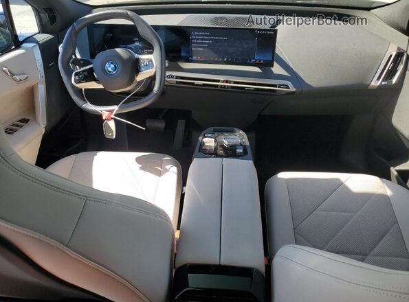 WB523CF0XSCS38055 2025 BMW IX Blue Առջևի վահանակի տեսք