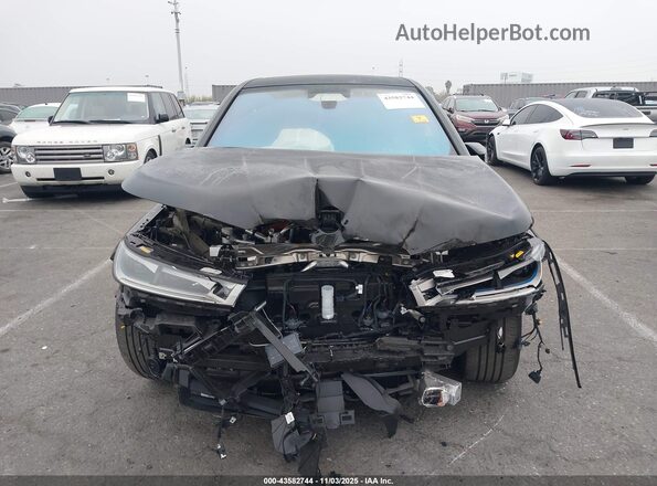 WB533CF06SCS53401 2025 BMW IX Black Widok wnętrza z tyłu