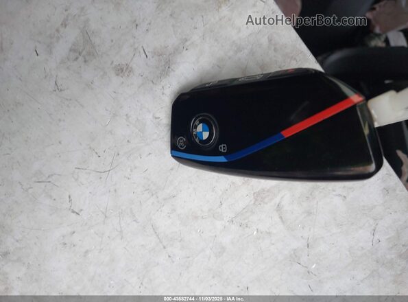 WB533CF06SCS53401 2025 BMW IX Black Widok deski rozdzielczej