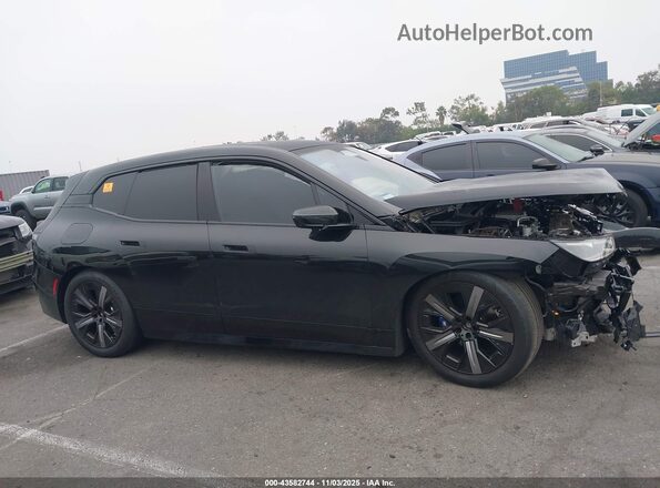 WB533CF06SCS53401 2025 BMW IX Black Widok wnętrza 360 stopni