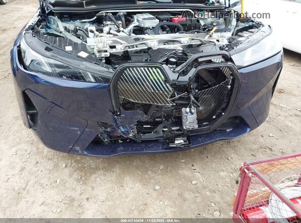 WB543CF00TCV89079 2026 BMW IX Blue Вид спереду