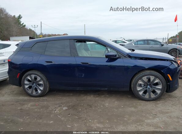WB543CF00TCV89079 2026 BMW IX Blue Панорамний вид салону 360°
