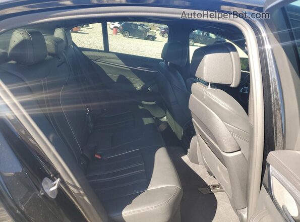 WBA13BK05MCG11439 2021 BMW M5 Black Vista de los asientos traseros