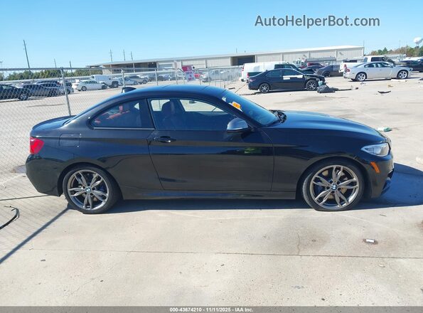 WBA1J7C52GV360057 2016 BMW M2 Black Vista interior trasera