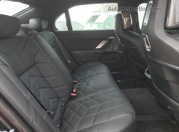 WBA23EH01SCV23009 2025 BMW 7 SERIES Charcoal Vista de los asientos traseros