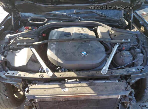 WBA23EH06PCM61565 2023 BMW 7 SERIES Black Vista interior trasera