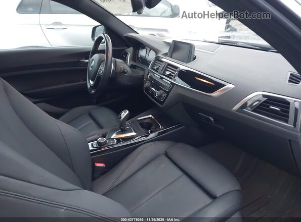 WBA2J3C04L7E60602 2020 BMW 2 SERIES Black Front interior view