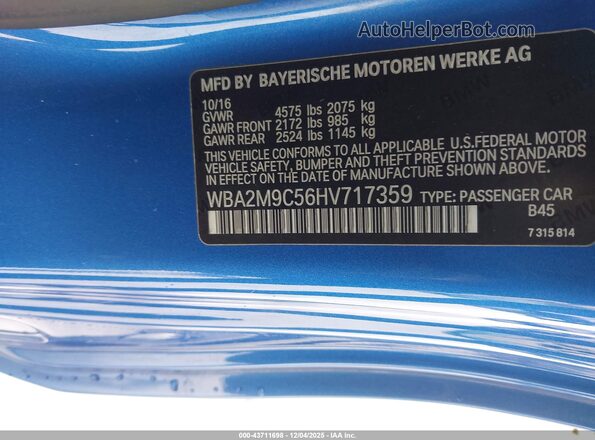 WBA2M9C56HV717359 2017 BMW 2 SERIES Blue Vista del compartimento del motor