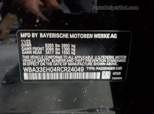 WBA33EH04RCR24049 2024 BMW 7 SERIES Black Вид підкапотного простору