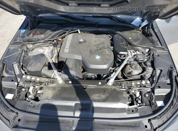 WBA43FJ02RCS16404 2024 BMW 5 SERIES Gray Vista interior trasera