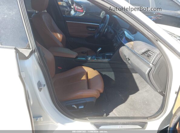 WBA4A9C59GG508248 2016 BMW 4 SERIES White Widok wnętrza z przodu