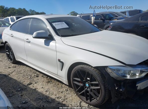 WBA4A9C59GG508248 2016 BMW 4 SERIES White Widok wnętrza z tyłu