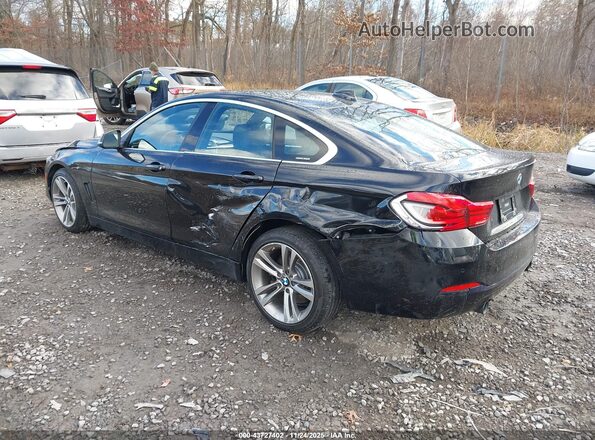WBA4J7C59JBH14150 2018 BMW 4 SERIES Black Rear left