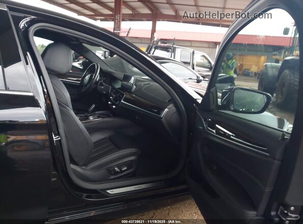 WBA53BH03MCF80958 2021 BMW 5 SERIES Black Front interior view