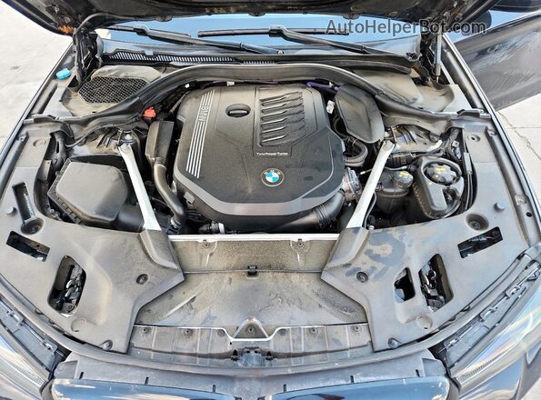 WBA53BJ06MWW91722 2021 BMW 5 SERIES Black Rear interior view