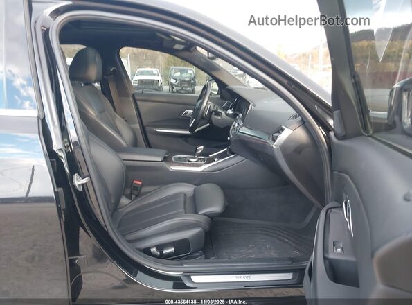 WBA5R7C09NFL66279 2022 BMW 3 SERIES Black Front interior view