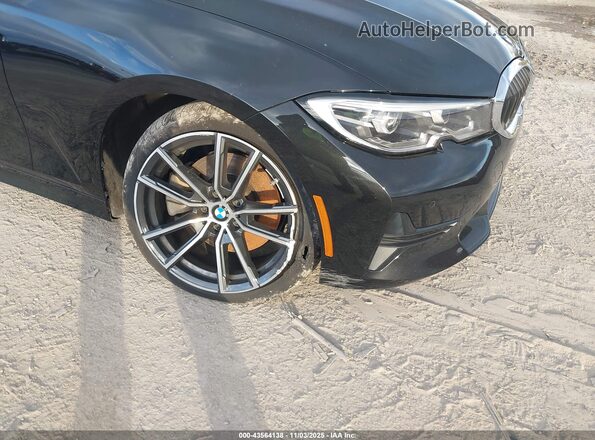 WBA5R7C09NFL66279 2022 BMW 3 SERIES Black Front view