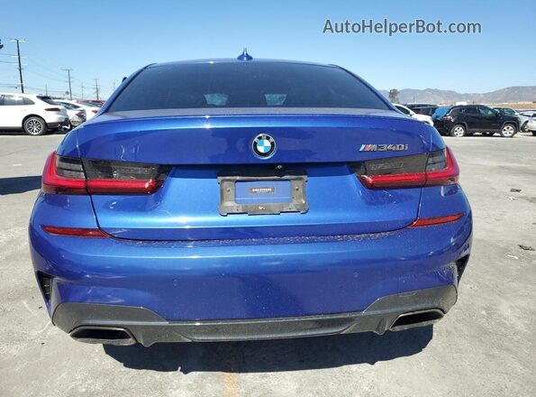 WBA5U7C03LAF54372 2020 BMW M3 Blue Հետևի տեսք