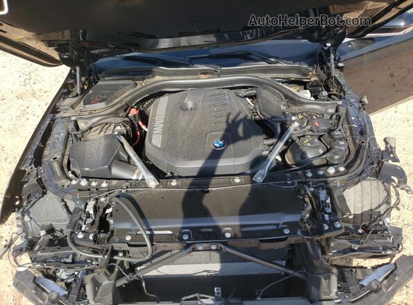 WBA63FJ05RCR20430 2024 BMW 5 SERIES Черный Вид задней части салона
