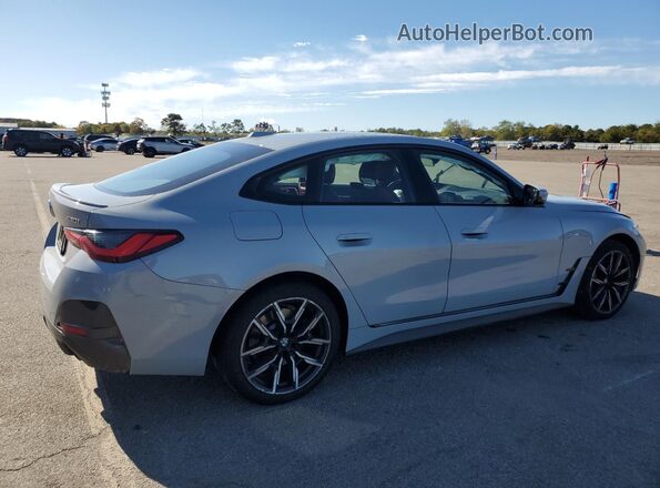 WBA73AV01PFN04758 2023 BMW 4 SERIES Gray Trasero derecho