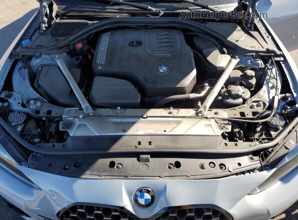 WBA73AV01PFN04758 2023 BMW 4 SERIES Gray Vista interior trasera