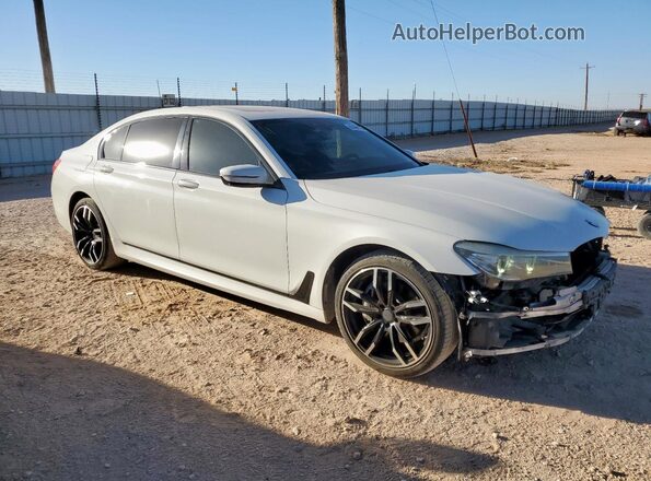 WBA7E2C5XGGD99925 2016 BMW 7 SERIES White Front right
