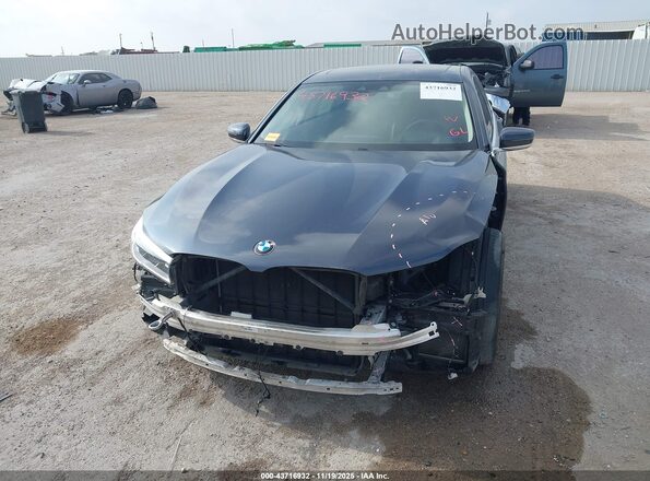 WBA7F0C59KGM25311 2019 BMW 7 SERIES Gray Rear interior view