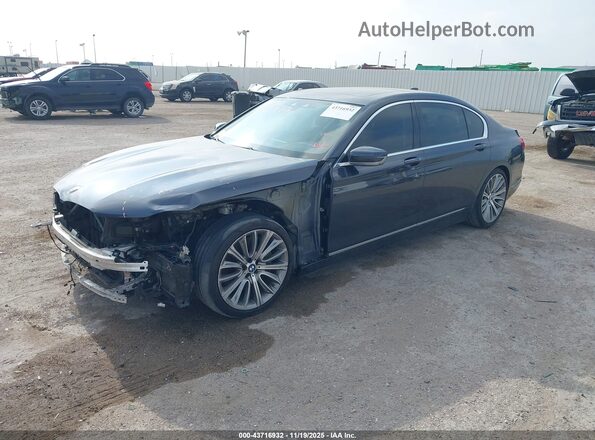 WBA7F0C59KGM25311 2019 BMW 7 SERIES Gray Front left