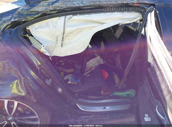 WBA7F2C53JB238766 2018 BMW 7 SERIES Black Vista de la etiqueta del VIN