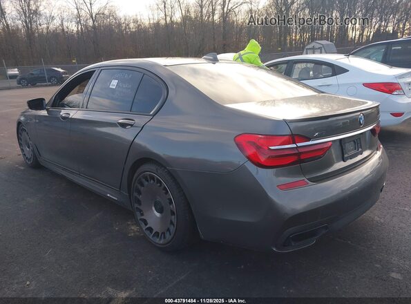 WBA7F2C58GG416117 2016 BMW 7 SERIES Gray Trasero izquierdo