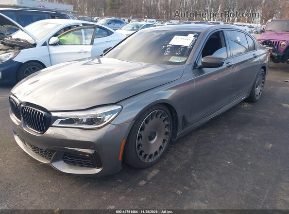 WBA7F2C58GG416117 2016 BMW 7 SERIES Gray Vista tres cuartos delantera izquierda