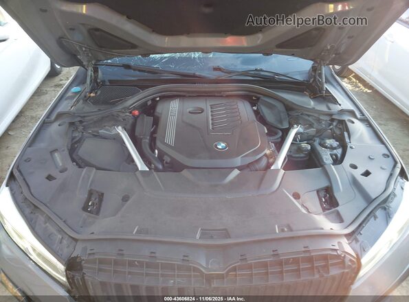 WBA7T2C03LGL17177 2020 BMW 7 SERIES Gray Widok z tyłu