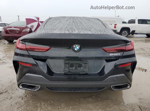 WBAAE2C09RCN70245 2024 BMW 8 SERIES Black Հետևի տեսք