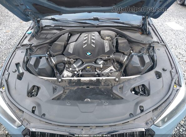 WBABC4C52KBU95952 2019 BMW M8 Blue Rear view