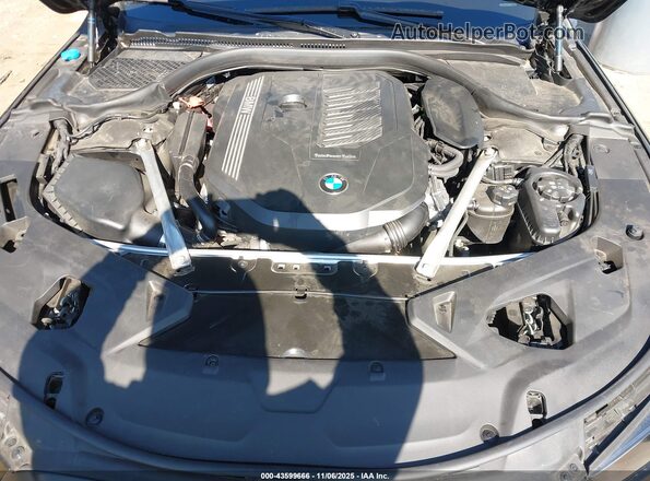 WBAGV2C01RCR84632 2024 BMW 8 SERIES Black Rear view
