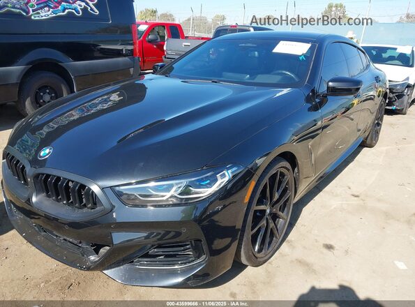 WBAGV2C01RCR84632 2024 BMW 8 SERIES Black Front view