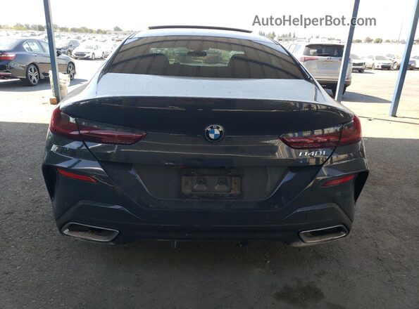 WBAGV2C02LCD29745 2020 BMW 8 SERIES Gray Вид ззаду