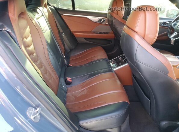 WBAGV2C04NCJ85650 2022 BMW 8 SERIES Blue Widok tylnych siedzeń