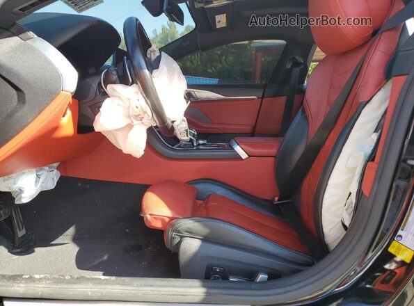 WBAGV2C07RCN75227 2024 BMW 8 SERIES Black Front interior view